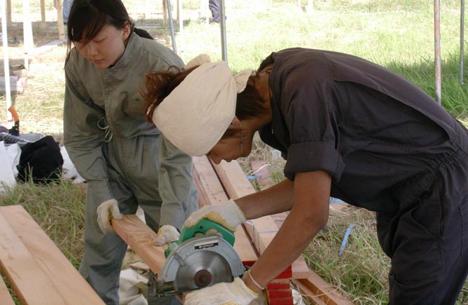 Yumi and Toshi as carpenters